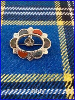 A 1.5 Sterling Silver Scots Curling Stone, Broom Brooch. Hallmarked Edinburgh